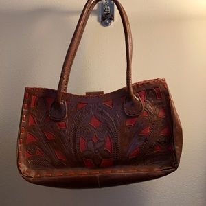 Cut leather bag